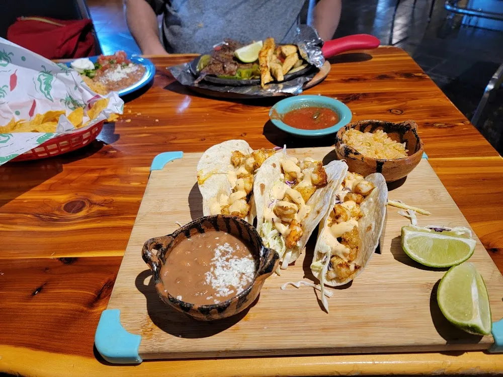Shrimp Tacos Foreground Steak and Chicken Fajitas Background